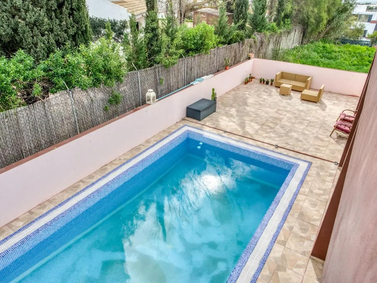 Cosy Holiday Home In Alvor With Swimming Pool